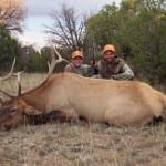Kole and Dad Cooper with Kole's awesome bull